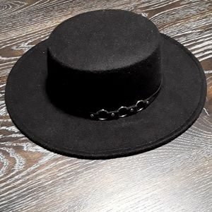 Black, large rimmed, round, culture club style hat